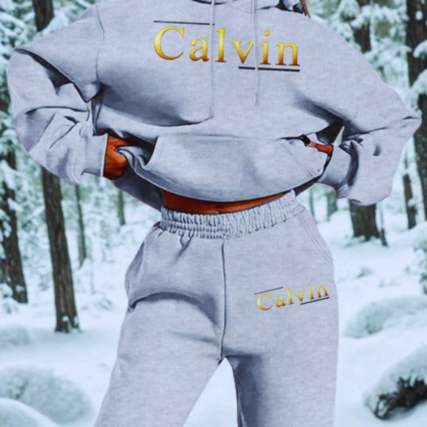 Person wearing a Calvin Klein hoodie and pants in a snowy forest