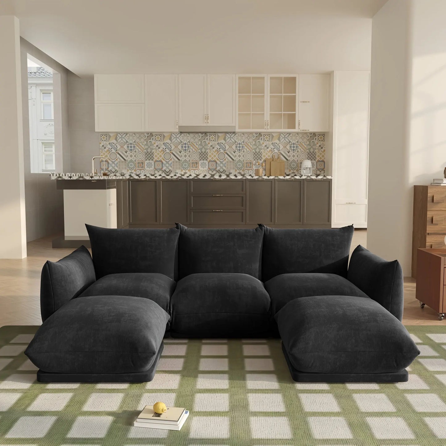 The Fantascticz Nexus Modular Sectional Sofa in sophisticated Black Chenille, arranged in a U-shape in a bright, modern open-plan living area.