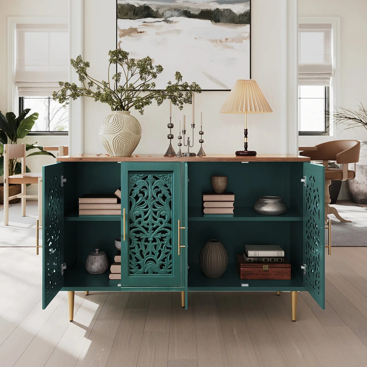 Teal cabinet with open doors displaying decorative items in a room with a painting and lamp.