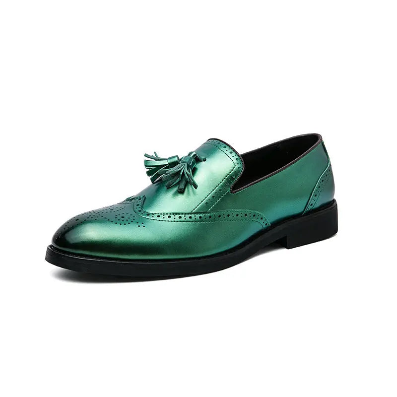 Profile view of The Strummer men's brogue loafer in high-gloss green leather, showing the tassel and intricate wing tip detailing.