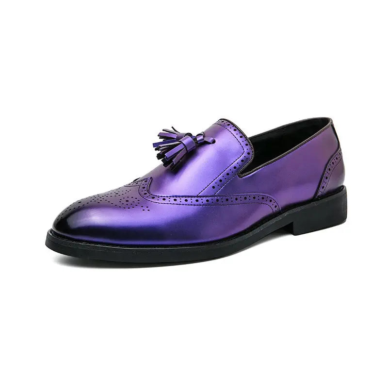 Profile view of The Strummer men's brogue loafer in high-gloss purple leather, showing the tassel and intricate wing tip detailing.