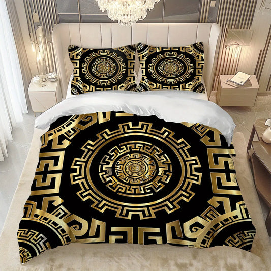 Decorative bedspread with gold and black pattern on a bed in a bedroom setting.