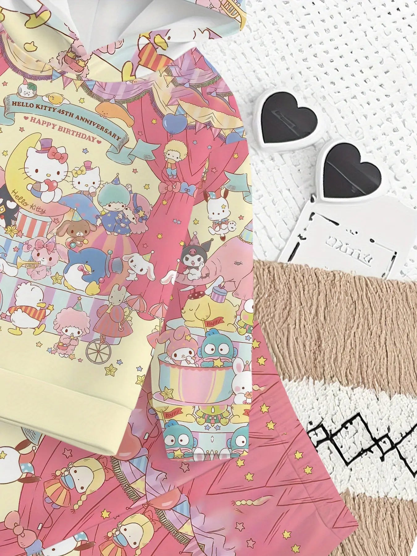 Colorful cartoon-themed paper with a pink number '9' on a textured surface.