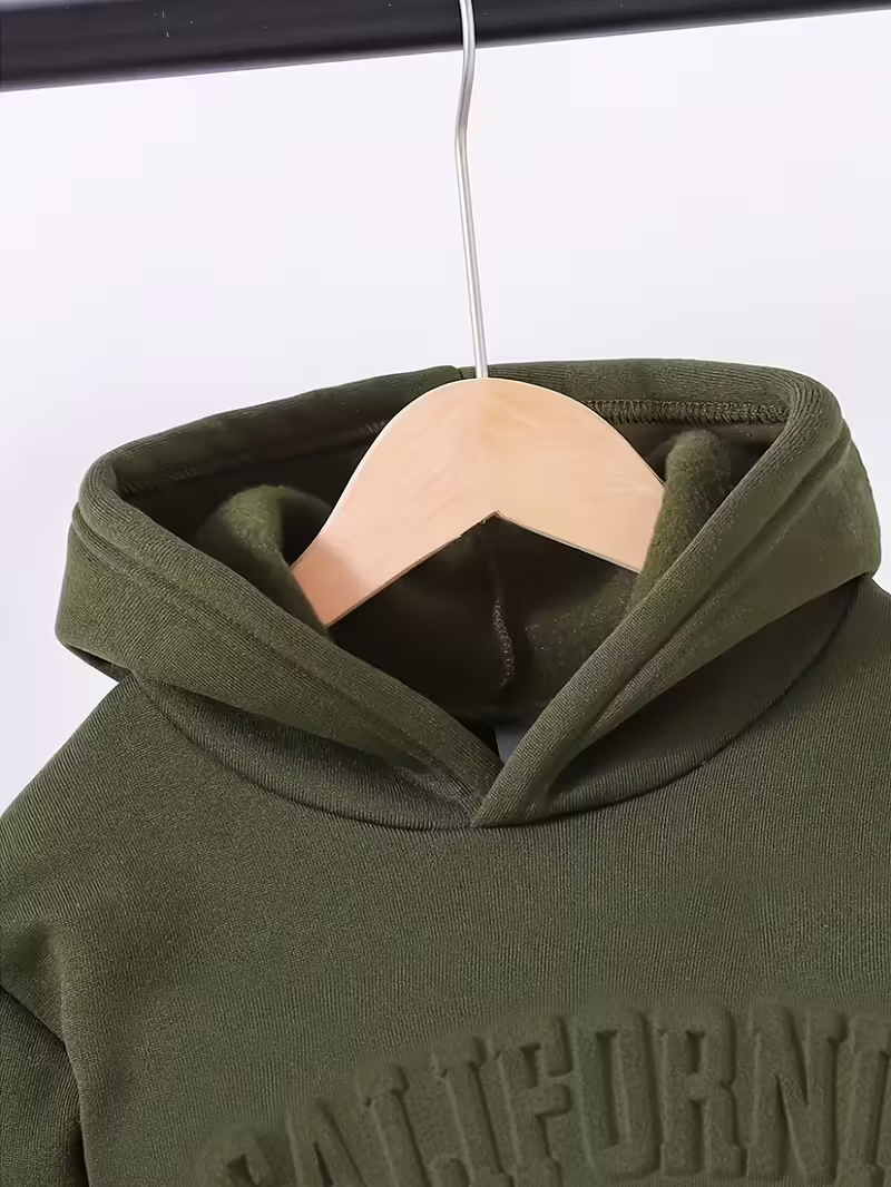Green hoodie with 'California' text on a hanger against a white background