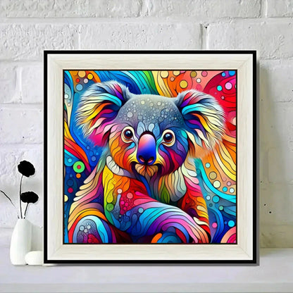 Colorful abstract koala painting in a white frame on a white brick wall background