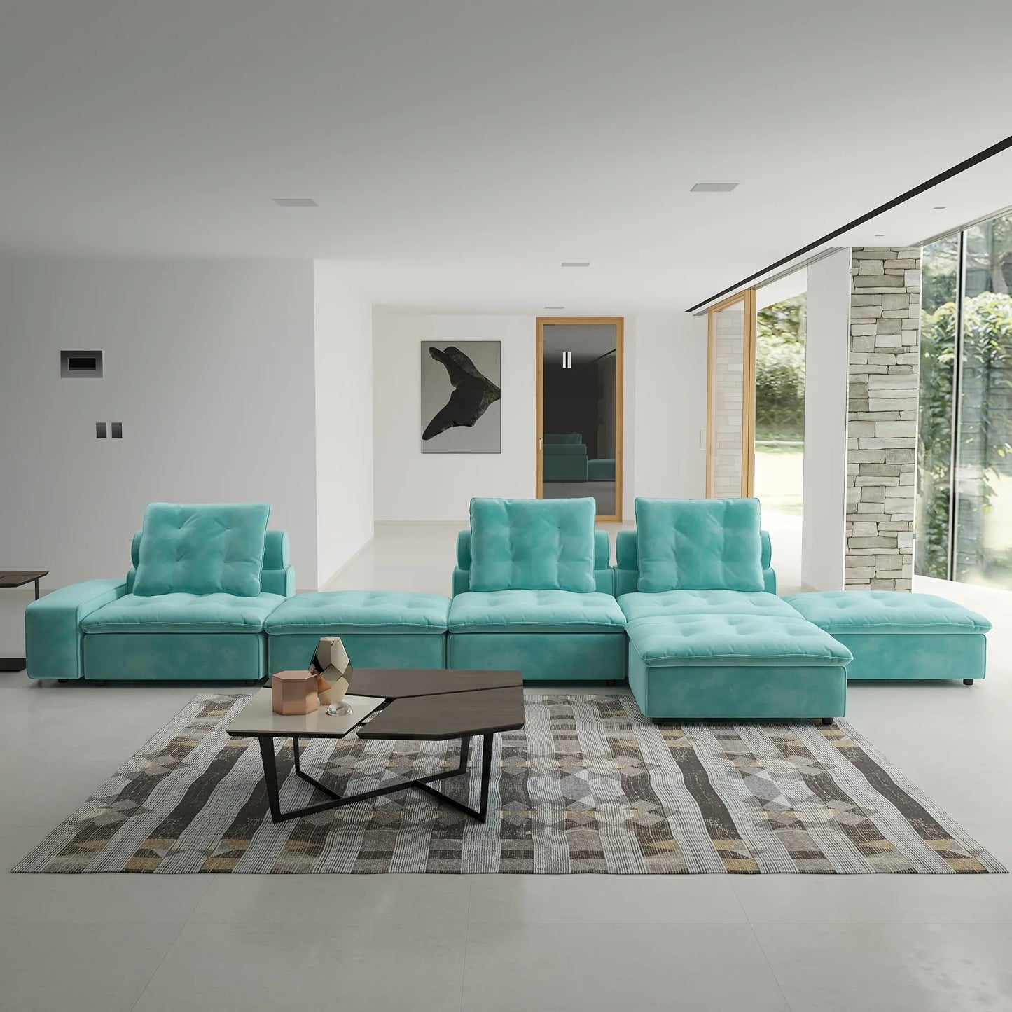 Turquoise sectional sofa in a modern living room with a coffee table and rug.