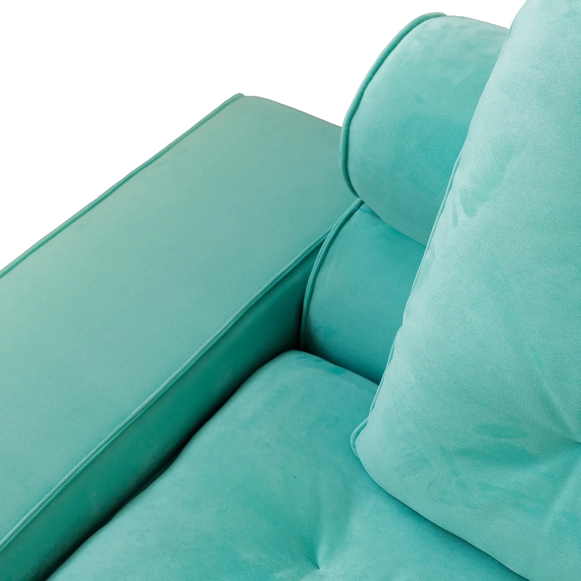 Close-up of a turquoise sofa with cushions on a white background