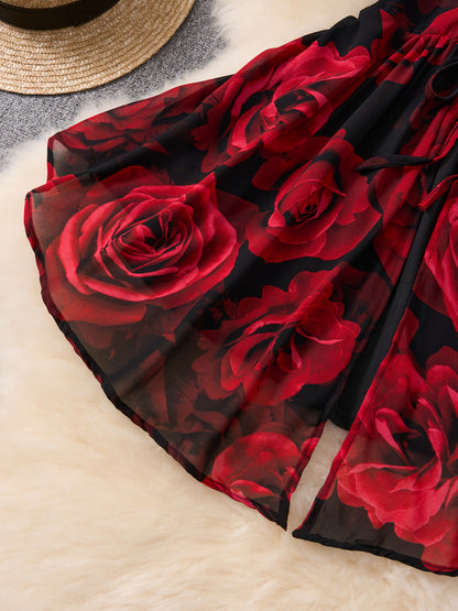 Red rose patterned fabric on a textured surface
