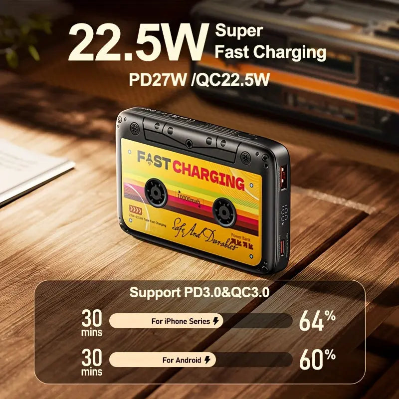 Cassette-style power bank with fast charging features on a wooden surface