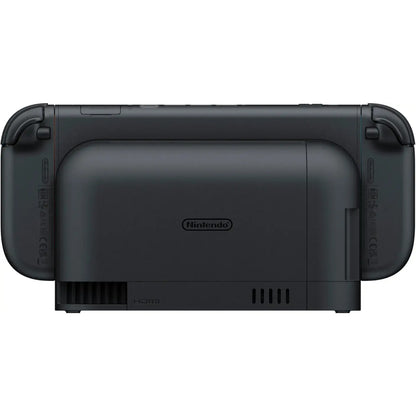 Back view of a black Nintendo Switch console seated in its black docking station, showing the Nintendo logo and port access area.