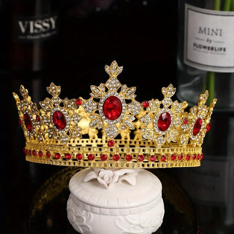 A second styled photo of The Sovereign Crown, displayed regally atop an ornate white ceramic trinket box against a dark, moody background.